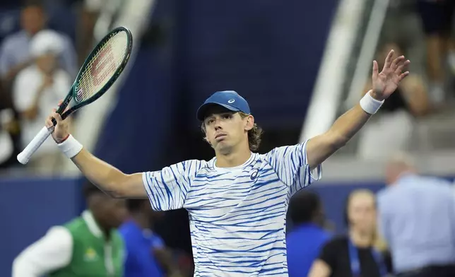 Alex de Minaur, of Australia, eacts after defeating Jordan Thompson, of Australia, during a fourth round match of the U.S. Open tennis championships, Monday, Sept. 2, 2024, in New York. (AP Photo/Eduardo Munoz Alvarez)