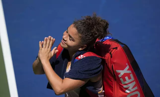 Jasmine Paolini, of Italy, reacts while leaving the court after losing to Karolina Muchova, of the Czech Republic, in their fourth round match of the U.S. Open tennis championships, Monday, Sept. 2, 2024, in New York. (AP Photo/Eduardo Munoz Alvarez)