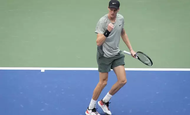 Jannik Sinner, of Italy, reacts after scoring a point against Taylor Fritz, of the United States, during the men's singles final of the U.S. Open tennis championships, Sunday, Sept. 8, in New York. 2024. (AP Photo/Frank Franklin II)