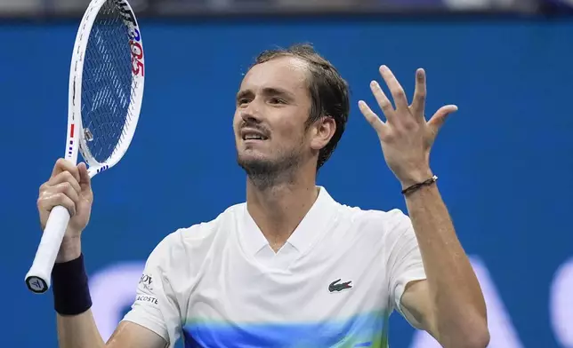 Daniil Medvedev, of Russia, reacts after scoring a point against to Flavio Cobolli, of Italy, during the third round of the U.S. Open tennis championships, Saturday, Aug. 31, in New York. 2024. (AP Photo/Matt Rourke)