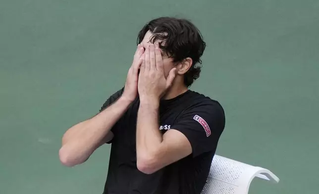 Taylor Fritz, of the United States, reacts after being defeated by Jannik Sinner, of Italy, in the men's singles final of the U.S. Open tennis championships, Sunday, Sept. 8, in New York. 2024. (AP Photo/Frank Franklin II)