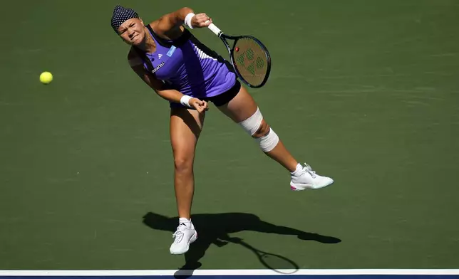 Daria Snigur, of Ukraine, serves during a match against Jessica Pegula, of the United States, in the fourth round of the U.S. Open tennis championships, Monday, Sept. 2, 2024, in New York. (AP Photo/Kirsty Wigglesworth)