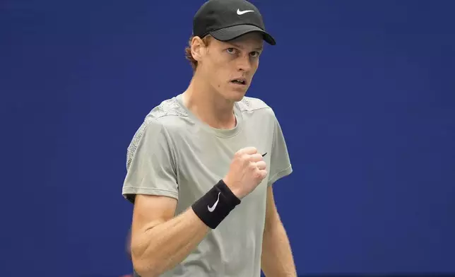 Jannik Sinner, of Italy, reacts after scoring a point against Taylor Fritz, of the United States, during the men's singles final of the U.S. Open tennis championships, Sunday, Sept. 8, in New York. 2024. (AP Photo/Seth Wenig)