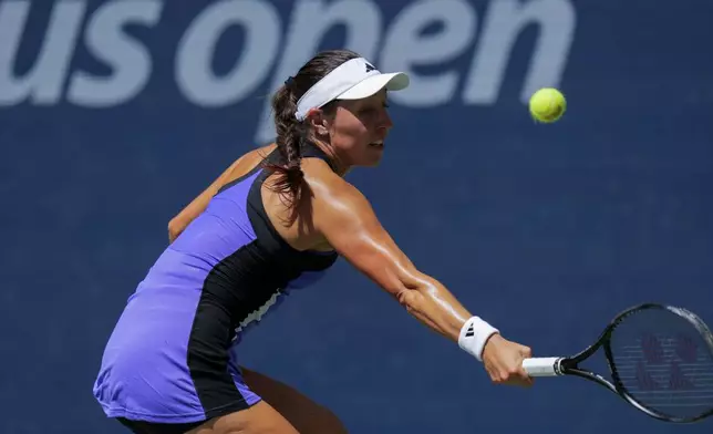 Jessica Pegula, of the United States, returns a shot during a match against Daria Snigur, of Ukraine, in the fourth round of the U.S. Open tennis championships, Monday, Sept. 2, 2024, in New York. (AP Photo/Kirsty Wigglesworth)