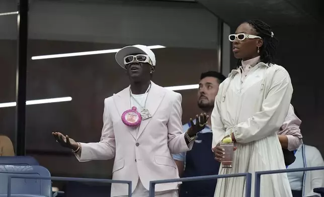 Flavor Flav arrives for the women's singles final of the U.S. Open tennis championships between Aryna Sabalenka, of Belarus, and Jessica Pegula, of the United States, Saturday, Sept. 7, 2024, in New York. (AP Photo/Frank Franklin II)