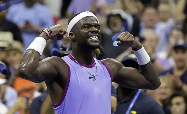 Frances Tiafoe, of the United States, reacts after defeating Alexei Popyrin, of Australia, during the fourth round of the U.S. Open tennis tournament Sunday, Sept. 1, 2024, in New York. (AP Photo/Adam Hunger)