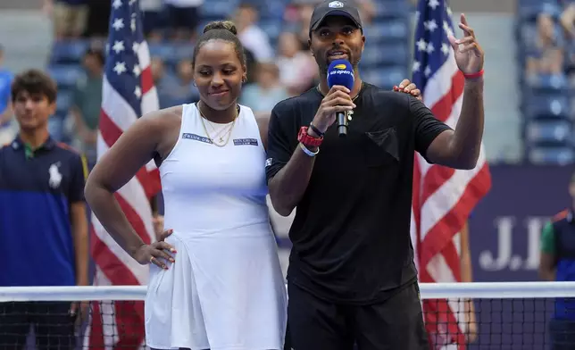 Donald Young, right, and Taylor Townsend, of the United States, talk to the crowd after loosing to Sara Errani, of Italy, and Andrea Vavassori, of Italy, during the mixed doubles final of the U.S. Open tennis championships, Thursday, Sept. 5, 2024, in New York. (AP Photo/Julia Nikhinson)