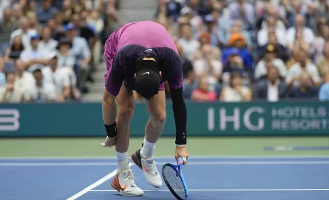 Jack Draper, of Great Britain, reacts after missing a shot from Jannik Sinner, of Italy, during the men's singles semifinal of the U.S. Open tennis championships, Friday, Sept. 6, 2024, in New York. (AP Photo/Julia Nikhinson)