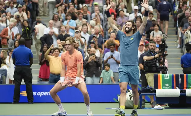 Max Purcell, left, and Jordan Thompson, of Australia, react after defeating Tim Puetz and Kevin Krawietz, of Germany in the men's doubles final of the U.S. Open tennis championships, Saturday, Sept. 7, 2024, in New York. (AP Photo/Pamela Smith)