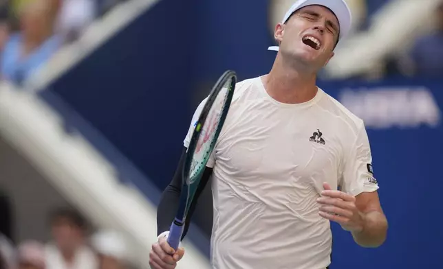 Christopher O'Connell, of Australia, reacts after losing a point to Jannik Sinner, of Italy, during the third round of the U.S. Open tennis championships, Saturday, Aug. 31, 2024, in New York. (AP Photo/Julia Nikhinson)