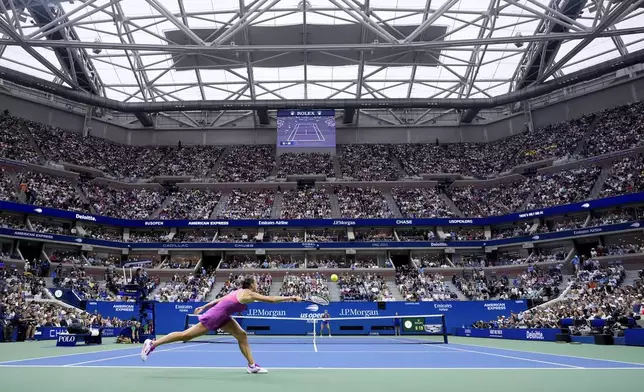 Aryna Sabalenka, of Belarus, can't catch up with a shot from Jessica Pegula, of the United States, during the women's singles final of the U.S. Open tennis championships, Saturday, Sept. 7, 2024, in New York. (AP Photo/Seth Wenig)