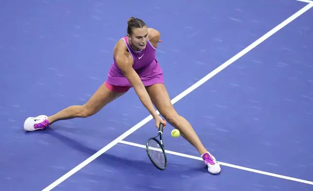 Aryna Sabalenka, of Belarus, returns a shot to Jessica Pegula, of the United States, during the women's singles final of the U.S. Open tennis championships, Saturday, Sept. 7, 2024, in New York. (AP Photo/Kirsty Wigglesworth)