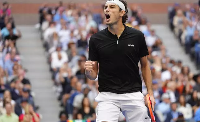 Taylor Fritz, of the United States, reacts in the third set against Jannik Sinner, of Italy, during the men's singles final of the U.S. Open tennis championships, Sunday, Sept. 8, 2024, in New York. (AP Photo/Kirsty Wigglesworth)