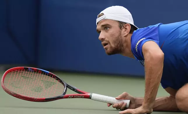 Tomas Machac, of the Czech Republic, watches after his return shot to David Goffin, of Belgium, during the third round of the U.S. Open tennis championships, Saturday, Aug. 31, 2024, in New York. (AP Photo/Julia Nikhinson)