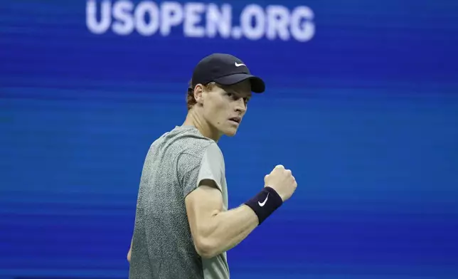 Jannik Sinner, of Italy, reacts against Tommy Paul, of the United States, during a fourth round match of the U.S. Open tennis championships, Monday, Sept. 2, 2024, in New York. (AP Photo/Adam Hunger)