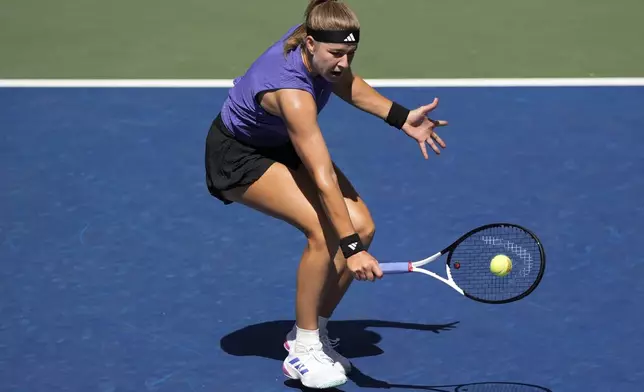 Karolina Muchova, of the Czech Republic, returns a shot during a match against Jasmine Paolini, of Italy, in the fourth round of the U.S. Open tennis championships, Monday, Sept. 2, 2024, in New York. (AP Photo/Eduardo Munoz Alvarez)