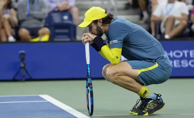 Jordan Thompson, of Australia, reacts against Alex de Minaur, of Australia, during a fourth round match of the U.S. Open tennis championships, Monday, Sept. 2, 2024, in New York. (AP Photo/Eduardo Munoz Alvarez)