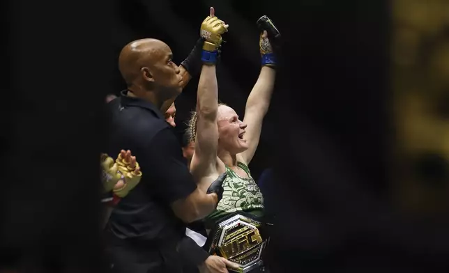 Valentina Shevchenko celebrates after defeating Alexa Grasso in a women's flyweight mixed martial arts title bout during UFC 306 at the Sphere, Saturday, Sept. 14, 2024, in Las Vegas. (Wade Vandervort/Las Vegas Sun via AP)