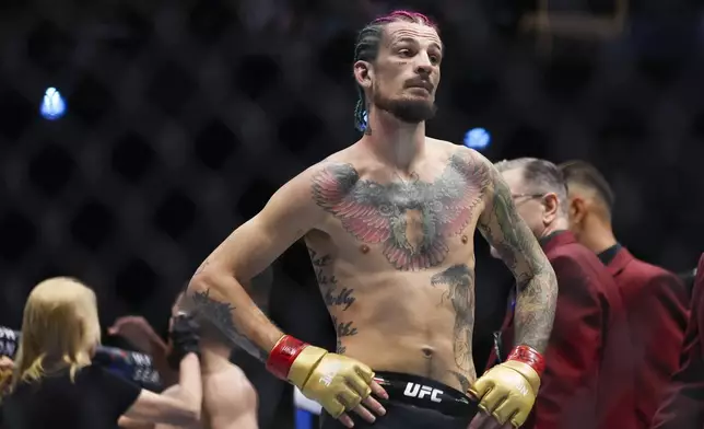 Sean O'Malley reacts after fighting Merab Dvalishvili in a bantamweight mixed martial arts title bout during UFC 306 at the Sphere, Saturday, Sept. 14, 2024, in Las Vegas. (Wade Vandervort/Las Vegas Sun via AP)