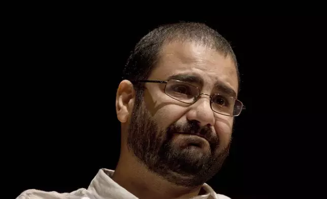 FILE - Egypt's leading pro-democracy activist Alaa Abdel-Fattah speaks during a conference at the American University in Cairo, Egypt, Sept. 22, 2014. (AP Photo/Nariman El-Mofty, File)