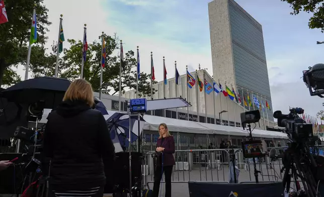 Television networks broadcast outside the United Nations before the start of the 79th Session of the UN General Assembly, Tuesday, Sept. 24, 2024, at UN headquarters. (AP Photo/Julia Demaree Nikhinson)