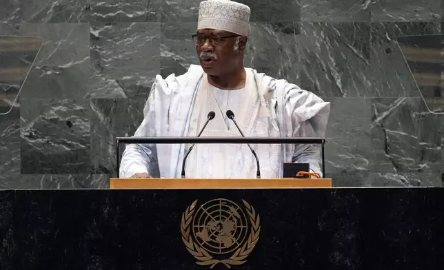 Philemon Yang, President of the General Assembly, addresses the 79th session of the United Nations General Assembly, Tuesday, Sept. 24, 2024. (AP Photo/Richard Drew)