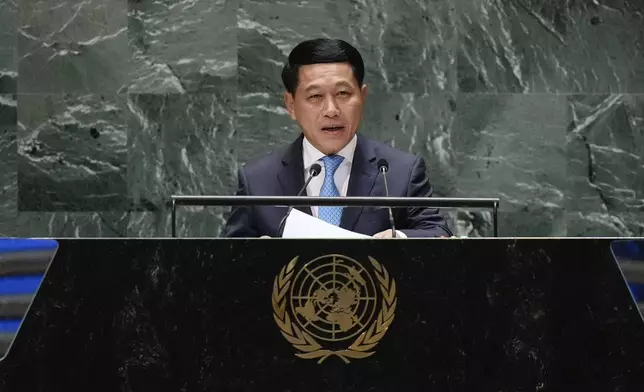 Laos Foreign Minister Saleumxay Kommasith speaks to the United Nations General Assembly during Summit of the Future, Sunday, Sept. 22, 2024 at U.N. headquarters. (AP Photo/Frank Franklin II)