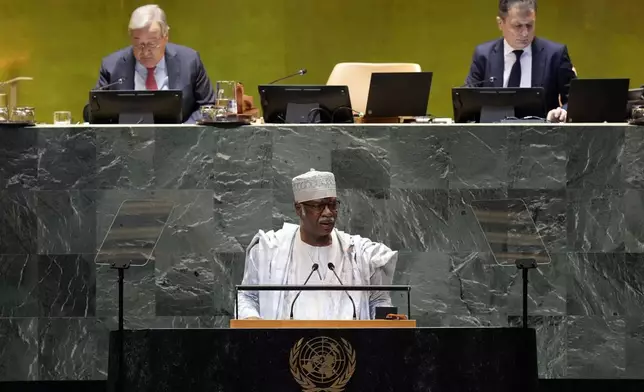 Philemon Yang, President of the General Assembly, addresses the 79th session of the United Nations General Assembly, Tuesday, Sept. 24, 2024. (AP Photo/Richard Drew)