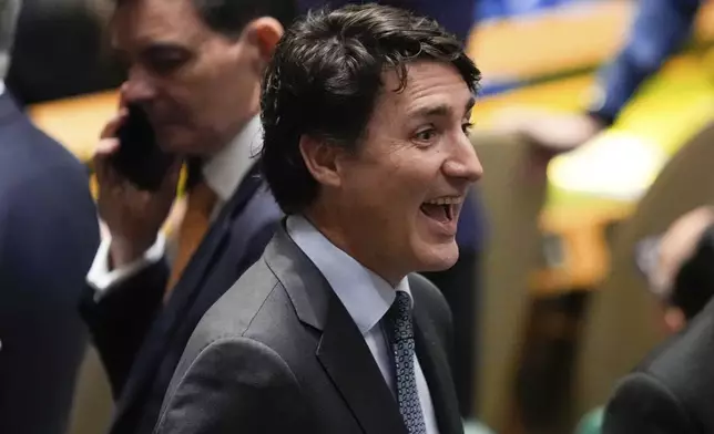 Canada's Prime Minister Justin Trudeau greets people during the 79th session of the United Nations General Assembly, Tuesday, Sept. 24, 2024, at the UN headquarters. (AP Photo/Julia Demaree Nikhinson)