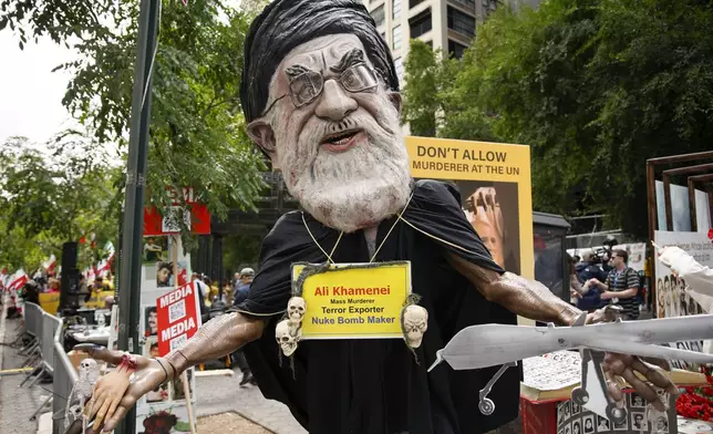 Demonstrators protest against the Iranian regime outside United Nations headquarters, Tuesday, Sept. 24, 2024, in New York. (AP Photo/Stefan Jeremiah)