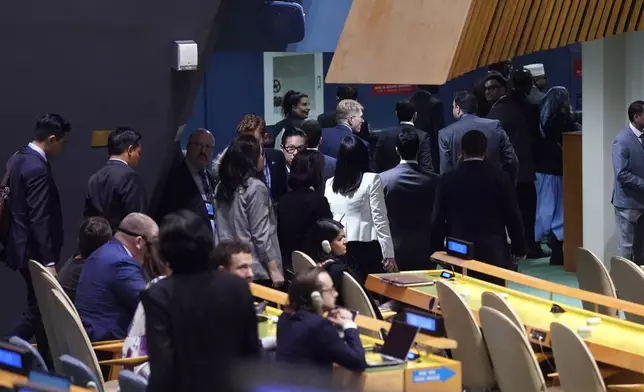 Delegates leave the General Assembly as Israel Prime Minister Benjamin Netanyahu addresses the 79th session of the United Nations General Assembly, Friday, Sept. 27, 2024. (AP Photo/Richard Drew)