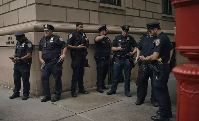 Police stand guard near Prime Minister of Israel, Benjamin Netanyahu's hotel during the 79th session of the United Nations General Assembly, in New York, on Friday, Sept. 27, 2024. (AP Photo/Andres Kudacki)