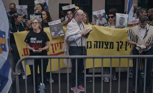 People protest against Prime Minister of Israel Benjamin Netanyahu during the 79th session of the United Nations General Assembly, in New York, on Friday, Sept. 27, 2024. (AP Photo/Andres Kudacki)