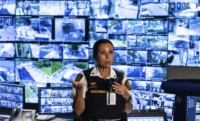 Security Inspector Malinda Mccormack speaks to the media during a tour of the UN Security Operations Center inside the United Nations Headquarters, Friday Sept. 20, 2024. (AP Photo/Stefan Jeremiah)