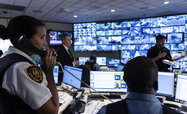 Security Inspector Malinda Mccormack speaks on the phone during a tour of the UN Security Operations Center inside the United Nations Headquarters, Friday Sept. 20, 2024. (AP Photo/Stefan Jeremiah)