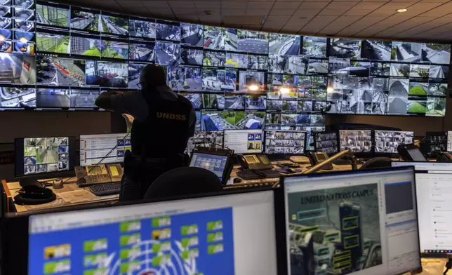 A UN security officer inside the UN Security Operations Center inside the United Nations Headquarters, Friday Sept. 20, 2024. (AP Photo/Stefan Jeremiah)