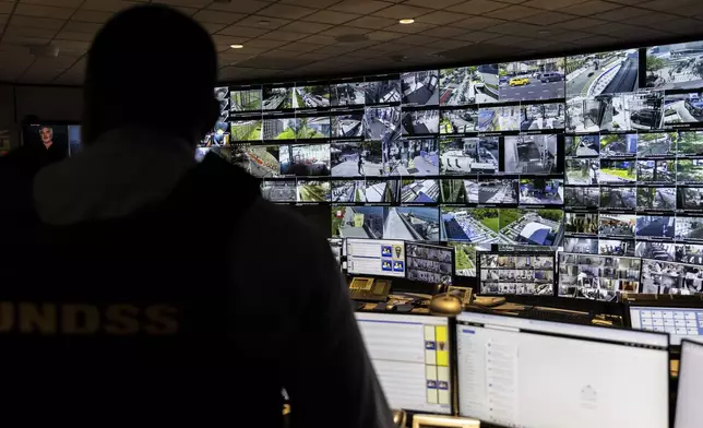 A U.N. security officer inside the U.N. Security Operations Center inside the United Nations Headquarters, Friday Sept. 20, 2024. (AP Photo/Stefan Jeremiah)