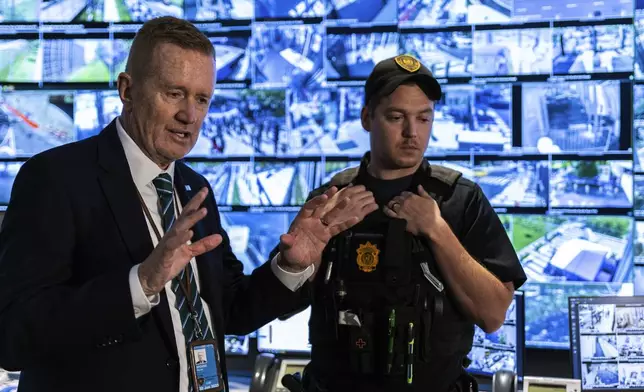 United Nations Department of Safety &amp; Security, Chief Michael Browne, left, speaks to the media during a tour of the UN Security Operations Center inside the United Nations Headquarters, Friday Sept. 20, 2024. (AP Photo/Stefan Jeremiah)