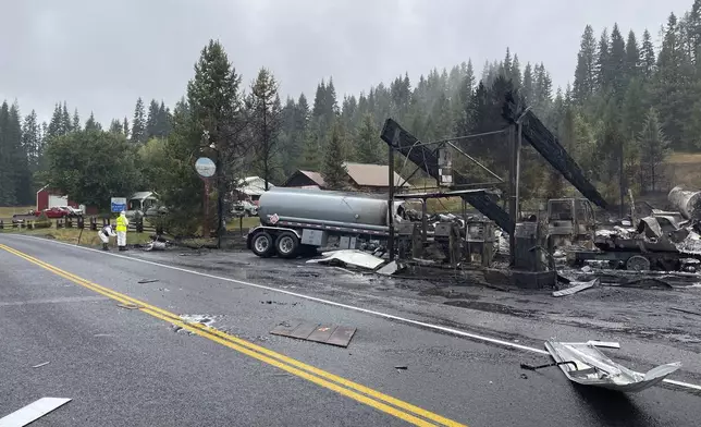 This photo provided by U.S. Bureau of Alcohol, Tobacco, Firearms and Explosives was taken in the aftermath of the Sept. 11, 2024, explosion and fire at a gas station in the small mountain community of Cardiff, Idaho. (U.S. Bureau of Alcohol, Tobacco, Firearms and Explosives via AP)