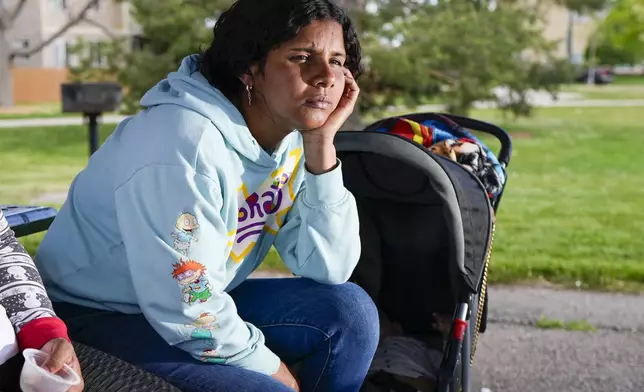 Ivanni Herrera looks on during an interview in a park Friday, May 18, 2024, in Aurora, Colo. (AP Photo/Jack Dempsey)