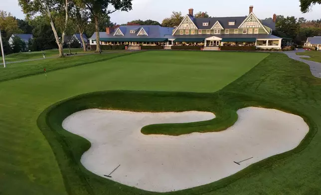 This is the ninth green in front of the clubhouse at Oakmont Country Club, in Oakmont, Pa., on Monday, Sept. 16, 2024. (AP Photo/Gene J. Puskar)