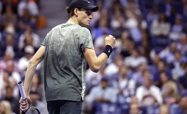 Jannik Sinner, of Italy, pumps his fist after winning a point against Daniil Medvedev, of Russia, during the quarterfinals of the U.S. Open tennis championships, Wednesday, Sept. 4, 2024, in New York. (AP Photo/Adam Hunger)