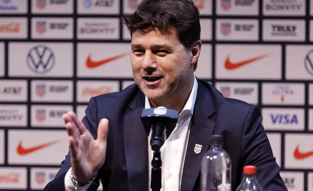 Mauricio Pochettino, the newly appointed head coach of the United States men's national soccer team, speaks at a press conference Friday, Sept. 13, 2024, in New York. (AP Photo/Adam Hunger)