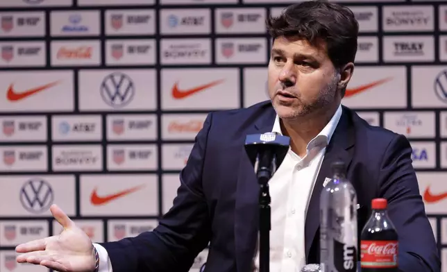 Mauricio Pochettino, the newly appointed head coach of the United States men's national soccer team, speaks at a press conference Friday, Sept. 13, 2024, in New York. (AP Photo/Adam Hunger)