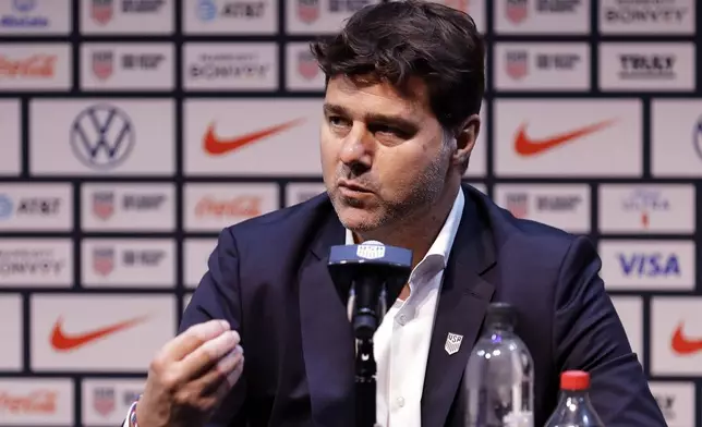 Mauricio Pochettino, the newly appointed head coach of the United States men's national soccer team, speaks at a press conference Friday, Sept. 13, 2024, in New York. (AP Photo/Adam Hunger)