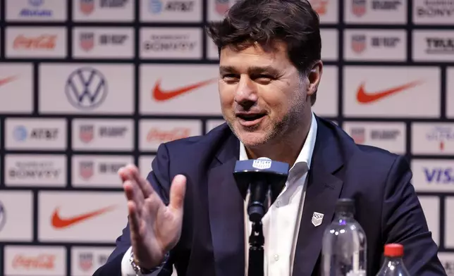 Mauricio Pochettino, the newly appointed head coach of the United States men's national soccer team, speaks at a press conference Friday, Sept. 13, 2024, in New York. (AP Photo/Adam Hunger)