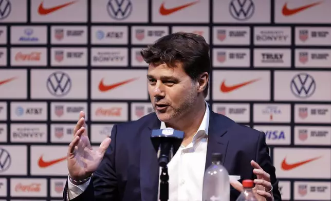 Mauricio Pochettino, the newly appointed head coach of the United States men's national soccer team, speaks at a press conference Friday, Sept. 13, 2024, in New York. (AP Photo/Adam Hunger)