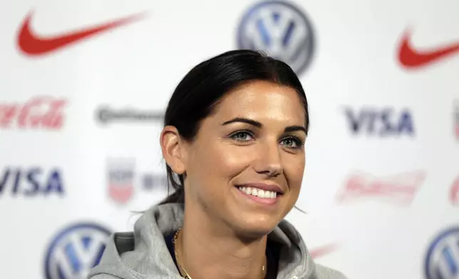 FILE - Alex Morgan, a member of the United States women's national soccer team, speaks to reporters during a news conference in New York, Friday, May 24, 2019. (AP Photo/Seth Wenig, File)