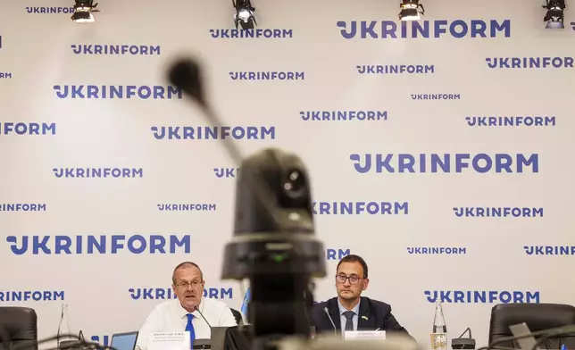 Doctor Hans Henri P. Kluge, WHO Regional Director for Europe, left, and Doctor Jarno Habicht, WHO Representative in Ukraine speak to the media during a press conference in Kyiv, Ukraine, Thursday Sept. 12, 2024. (AP Photo/Evgeniy Maloletka)