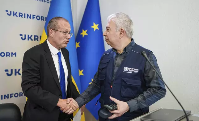 Doctor Hans Henri P. Kluge, WHO Regional Director for Europe, left, attends a press conference in Kyiv, Ukraine, Thursday Sept. 12, 2024. (AP Photo/Evgeniy Maloletka)